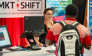 MKT+SHIFT/Tech Drive Creative Studios booth at D&H Technology Event
